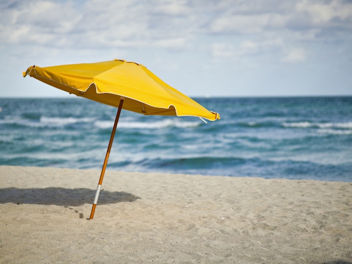 Como Colocar Guarda-Sol na Areia?