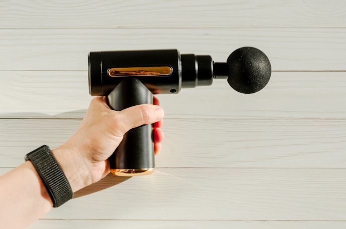 Se Busca uma Pistola Massageadora Profissional, Prefira Opções com Bateria Removível