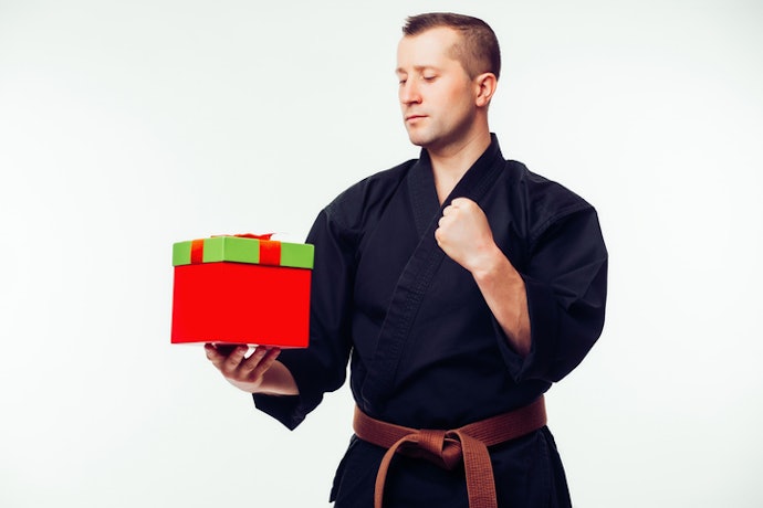 Presente para Professor de Jiu-Jitsu ou Judô? Prefira Squeeze, Camiseta ou Massageador Elétrico